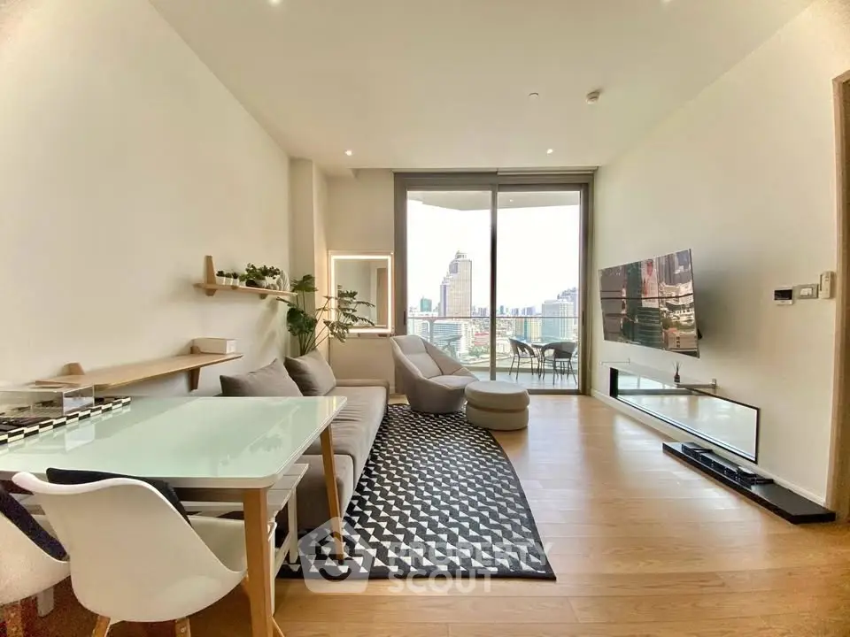 Modern living room with city view, stylish furniture, and elegant decor in a high-rise apartment.