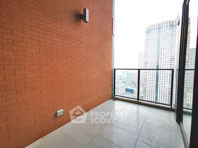 Spacious balcony with city view in modern high-rise apartment