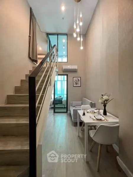 Modern duplex apartment with stylish interior and elegant lighting