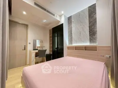 Modern bedroom with elegant design and cozy atmosphere, featuring stylish furniture and ambient lighting.