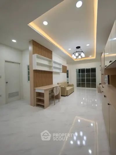 Modern living room with elegant lighting and sleek furniture design