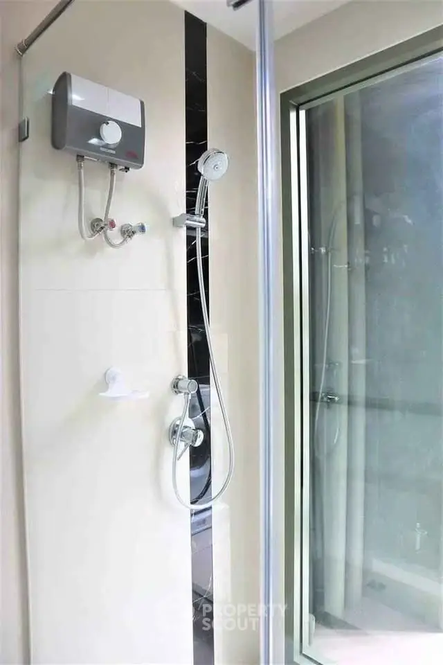 Modern bathroom with sleek shower and glass enclosure