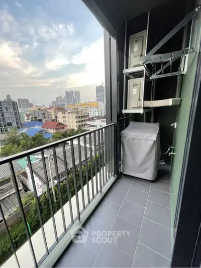 Modern balcony with city view and storage units, perfect for urban living.