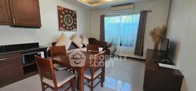 Cozy living room with dining area and modern decor in a stylish apartment