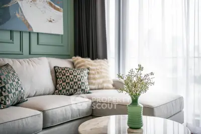 Stylish living room with elegant sofa and chic decor in modern apartment