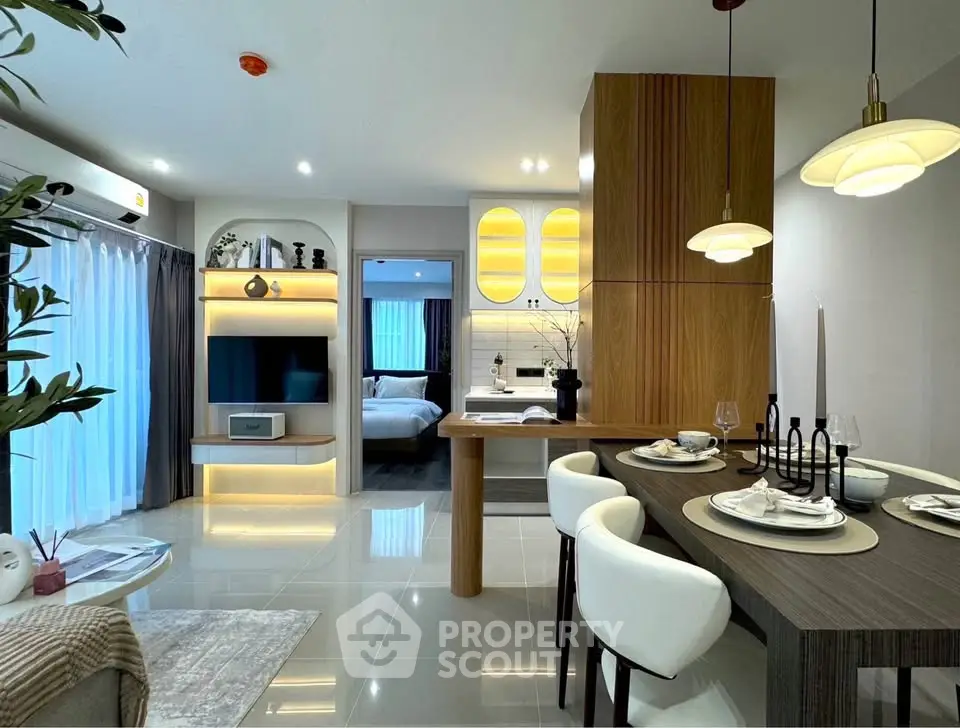 Modern open-plan living room with elegant dining area and stylish decor