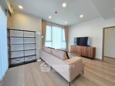 Spacious modern living room with elegant decor and natural light