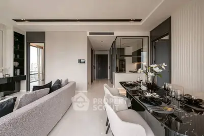 Luxurious modern living room with elegant dining area and open kitchen layout.