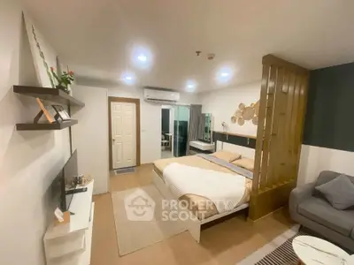 Modern studio apartment with cozy bedroom and stylish decor