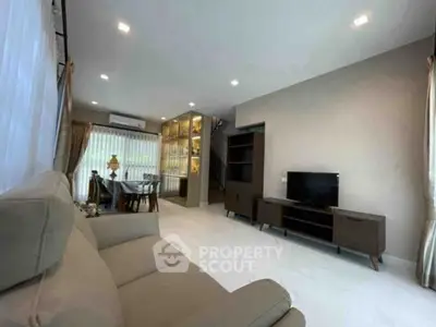 Spacious modern living room with elegant dining area and stylish decor