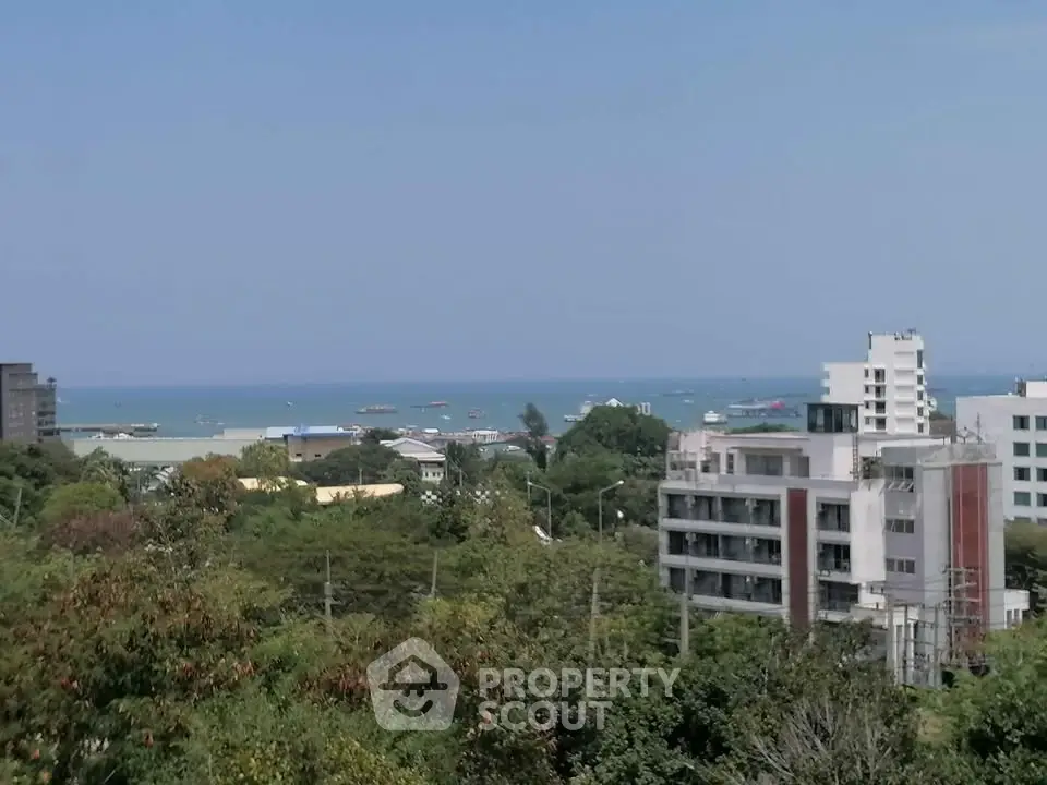Stunning ocean view from high-rise building, perfect for serene living.