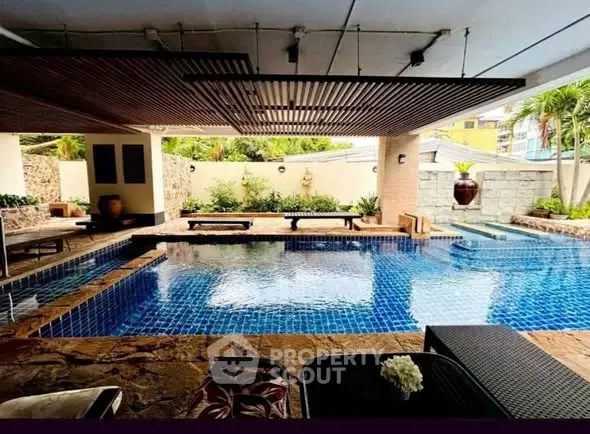 Luxurious indoor pool area with elegant design and relaxing ambiance.
