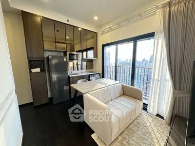 Modern living room with city view, featuring sleek kitchen and cozy seating area, perfect for urban living.