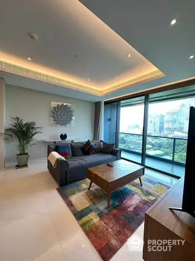 Luxurious living room with modern decor and stunning city view from large windows.