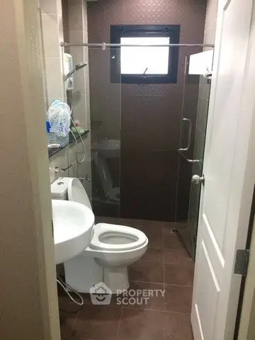Modern bathroom with glass shower and sleek fixtures