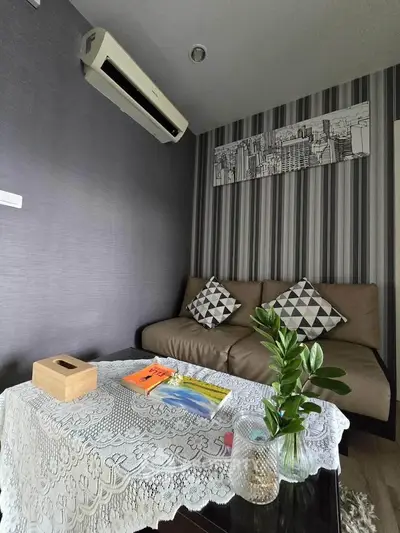 Cozy living room with modern decor and air conditioning