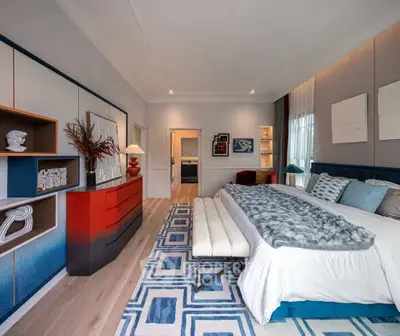 Luxurious modern bedroom with stylish decor and spacious layout