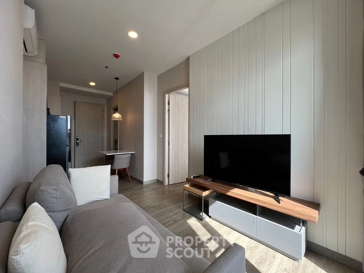 Modern living room with sleek furniture and natural light