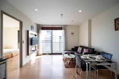 Modern living room with balcony view in a stylish apartment