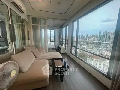 Luxurious living room with panoramic city view and modern furnishings