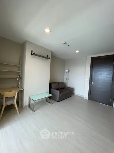 Modern living room with minimalist furniture and neutral tones