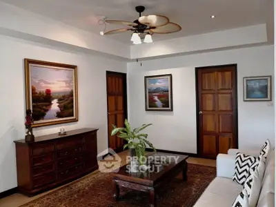 Elegant living room with classic wooden furniture and stylish decor