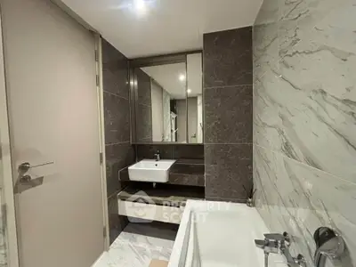Modern bathroom with sleek design and marble accents