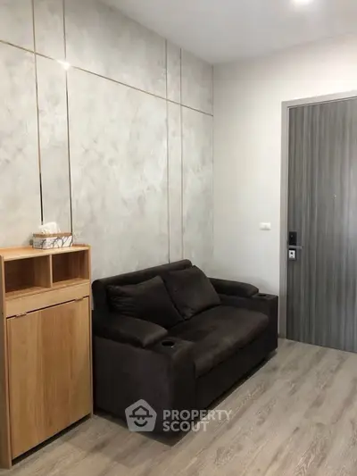Modern living room with sleek sofa and stylish wooden cabinet