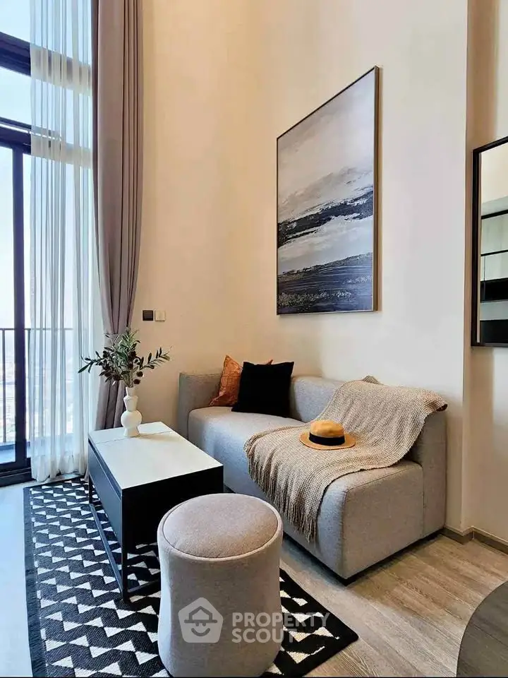 Modern living room with high ceilings and stylish decor