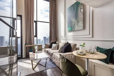 Luxurious modern living room with stunning city view and elegant decor