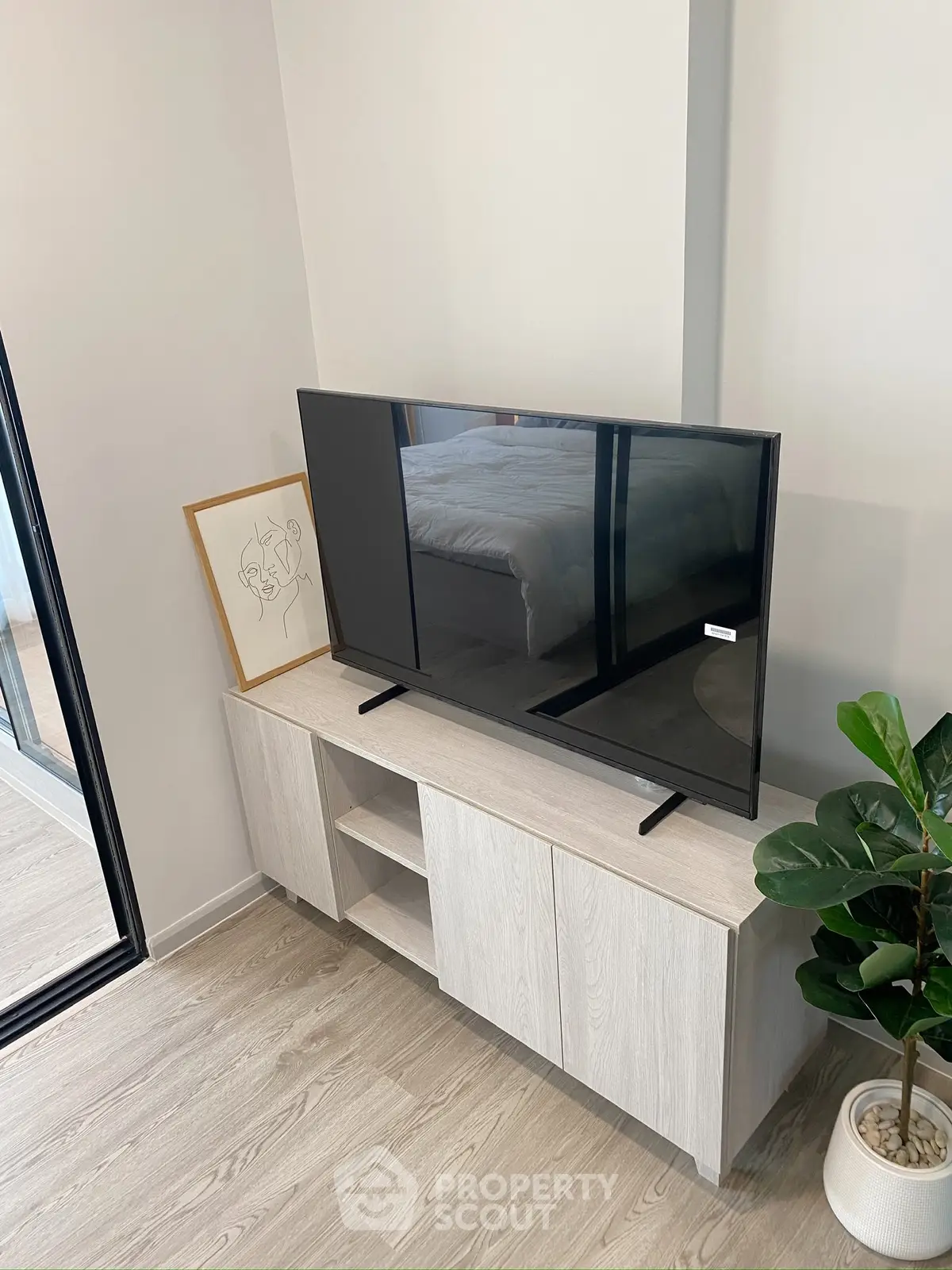 Modern living room with sleek TV setup and stylish decor