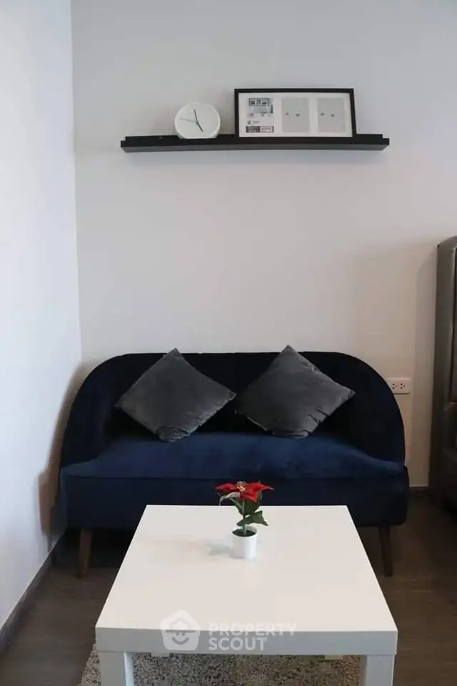 Cozy living room corner with plush sofa and modern decor