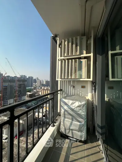 Modern balcony with city view and washing machine, ideal for urban living