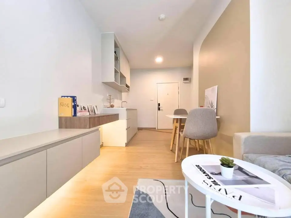 Modern open-plan living room with stylish decor and cozy seating area