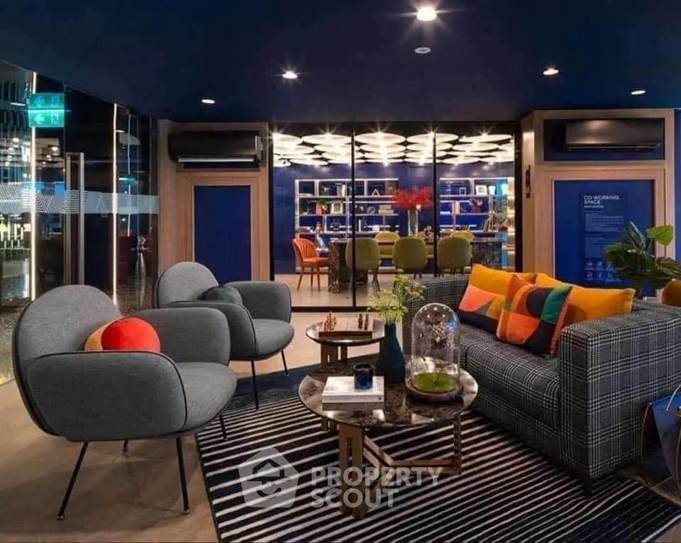 Stylish modern living room with vibrant decor and cozy seating area.