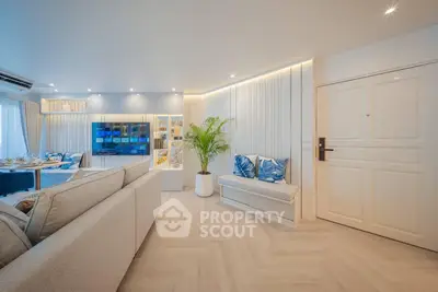 Luxurious modern living room with elegant decor and spacious seating area