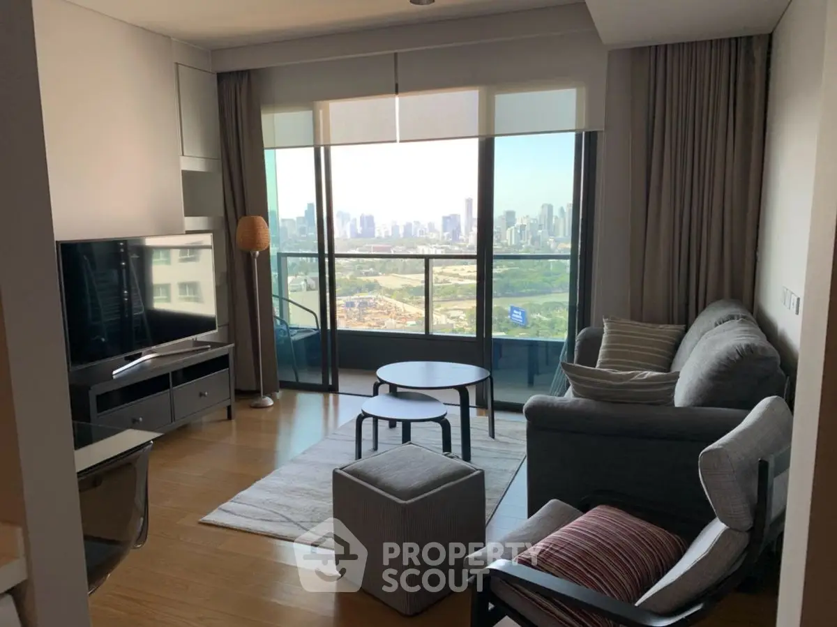 Modern living room with city view, stylish furniture, and large windows in urban apartment.