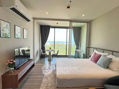 Modern bedroom with stunning ocean view and elegant decor