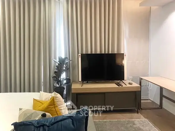 Modern living room with sleek TV setup and stylish decor