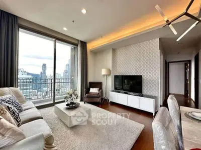 Luxurious living room with city view, modern decor, and elegant furnishings in high-rise apartment.