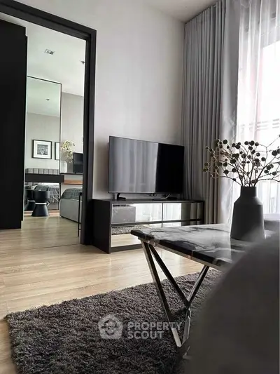 Modern living room with sleek TV stand and stylish decor