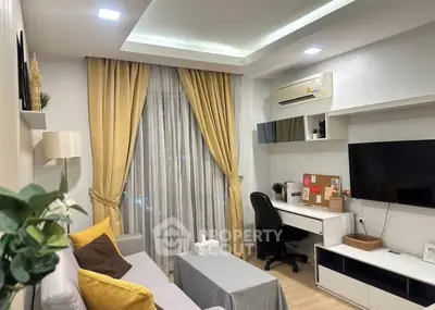 Modern living room with cozy sofa, study desk, and stylish decor