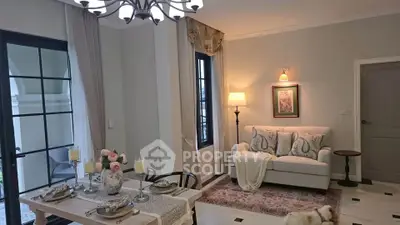 Charming living room with elegant dining area and cozy seating, perfect for relaxation and entertaining.