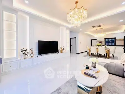 Luxurious living room with elegant chandelier and modern decor