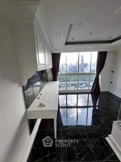 Luxurious high-rise apartment with stunning city view and elegant black marble flooring.