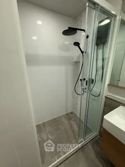 Modern bathroom with sleek shower and stylish fixtures
