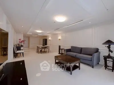 Spacious and elegant living room with modern furniture and bright lighting