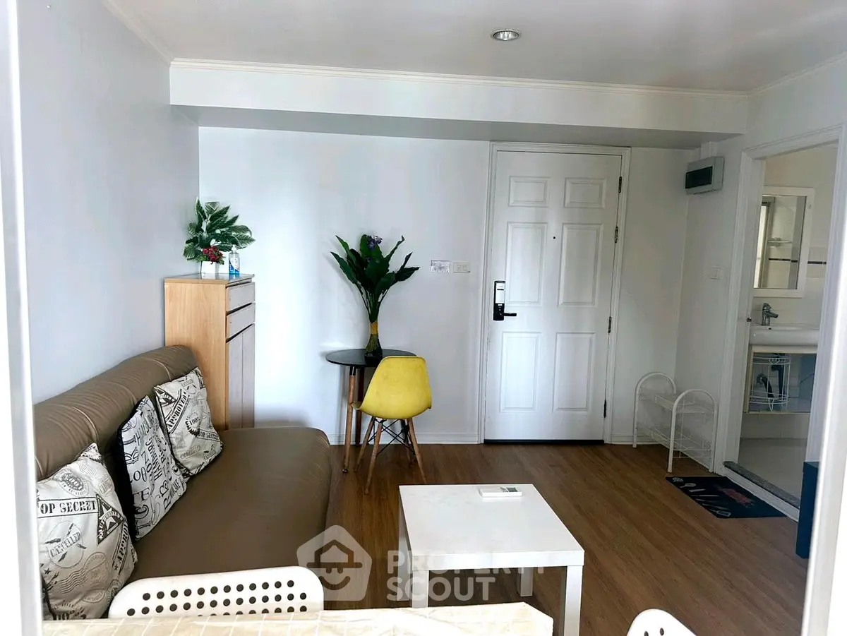 Cozy living room with modern decor and wooden flooring