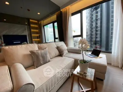 Modern living room with large windows and elegant decor in urban apartment