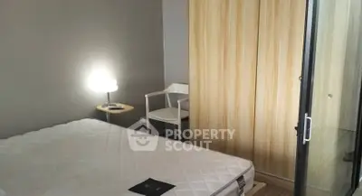 Cozy bedroom with modern furniture and ample storage space